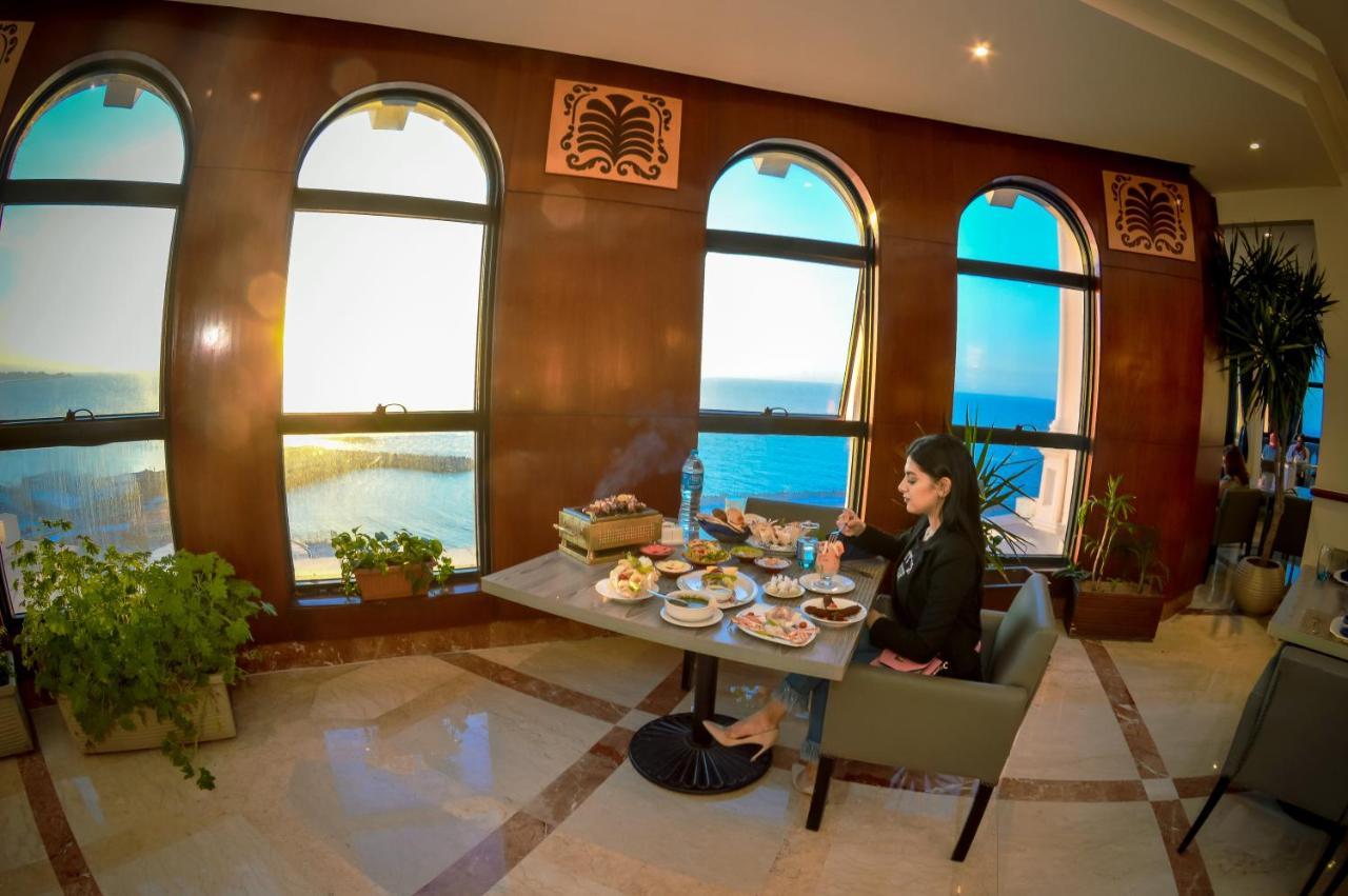 Tolip Hotel Alexandria Bagian luar foto The Sky Lounge