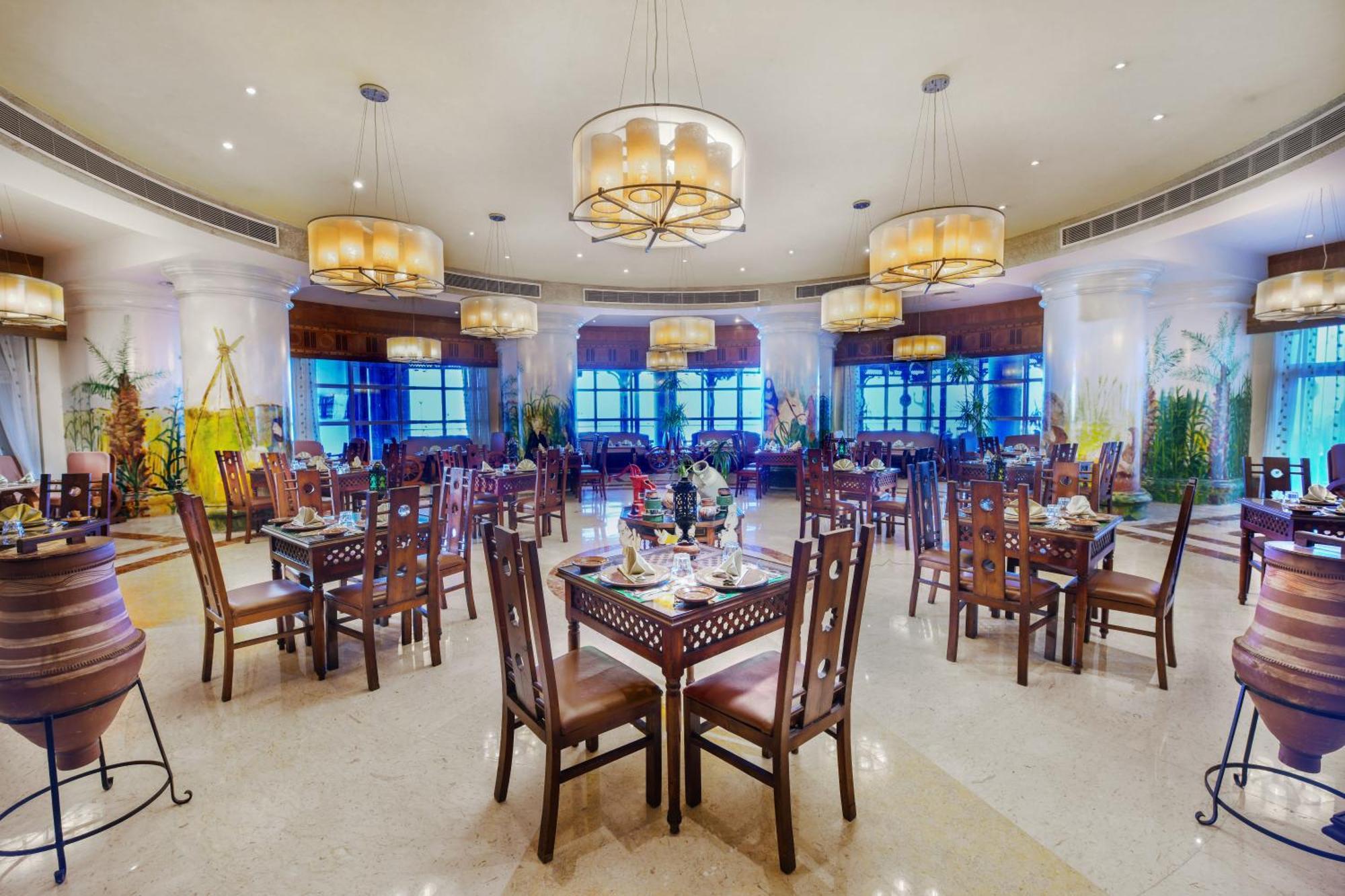 Tolip Hotel Alexandria Bagian luar foto The restaurant at the hotel